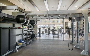 24-Hour indoor/outdoor fitness center with free weights and cardio machines
